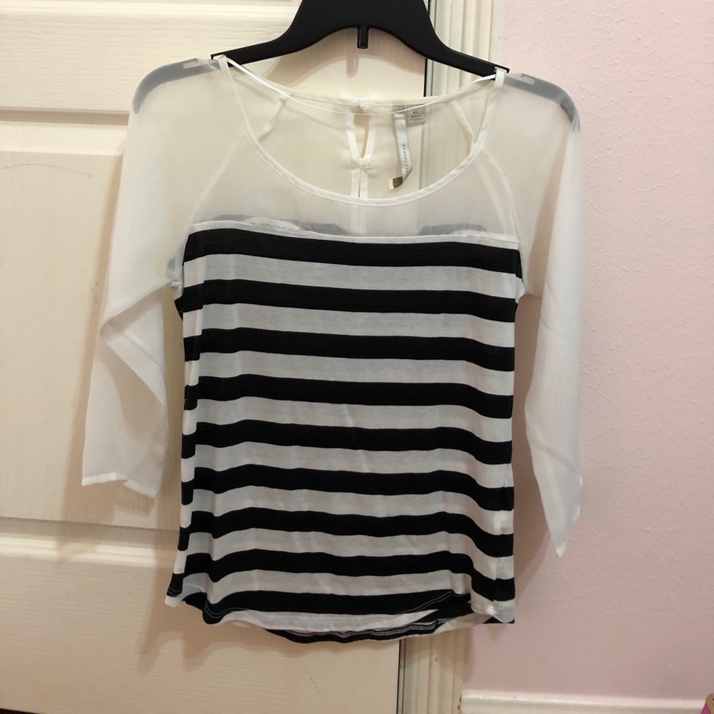Super cute shirt that can be dressed up or down!